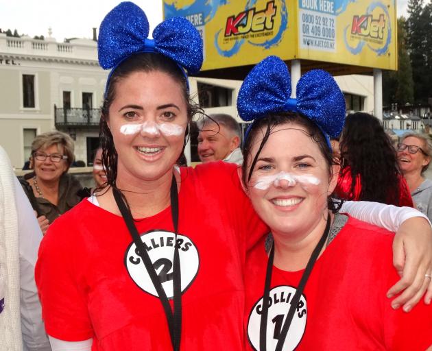 Cure Kids $10 Queenstown Challenge competitors Sarah Hoogvliet (left) and Raylene McQueen in Queenstown Bay on Saturday. Photo by David Williams.