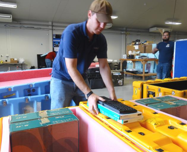 Nasa electrical engineer Chris Fields packs away computer equipment used in the launch of the space agency's super pressure balloon from Wanaka Airport. By next week all that will be left of the mission will be the launch pad. Photo: Tim Miller.