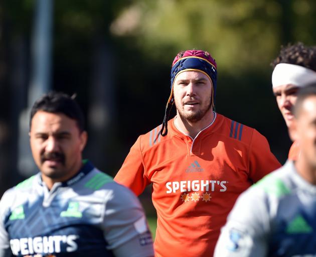 Highlanders lock Joe Wheeler at training at Logan Park this week. In front of him are (from left)...