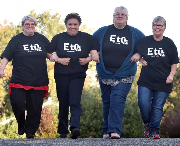 Celebrating the pay rise announcement yesterday are (from left) Etu organiser Ann Galloway, and care workers Ange Wilson, Pam Bates, and Ailsa Hawkins. Photo by Peter McIntosh.