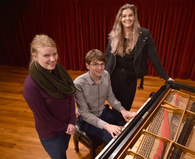University of Otago singers Erica Paterson (left), Nathaniel Otley and Rhiannon Cooper rehearse in Marama Hall after being selected for the New Zealand Youth Choir. Absent: Matariki Pakaua and Benedict Tan. Photo by Gregor Richardson.