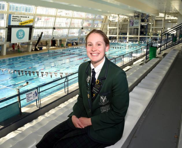 Columba College pupil Caitlin Deans (17) back at Moana Pool yesterday after having been away in the United States. Photo: Gregor Richardson.