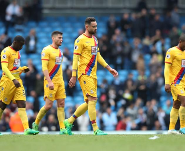 Crystal Palace players after their loss to Manchester City. Photo: Getty Images