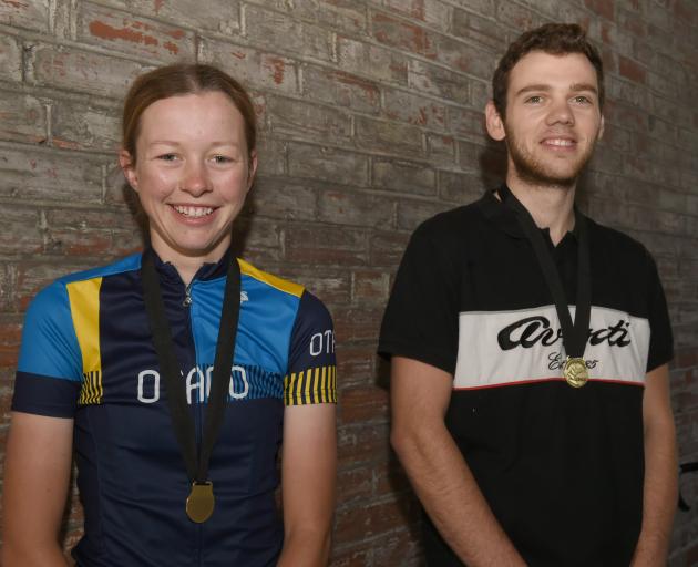 Otago cyclists Ella Harris and Will Milburn celebrate winning a gold medal each at the recent age group nationals in Cambridge. Photo: Gregor Richardson.