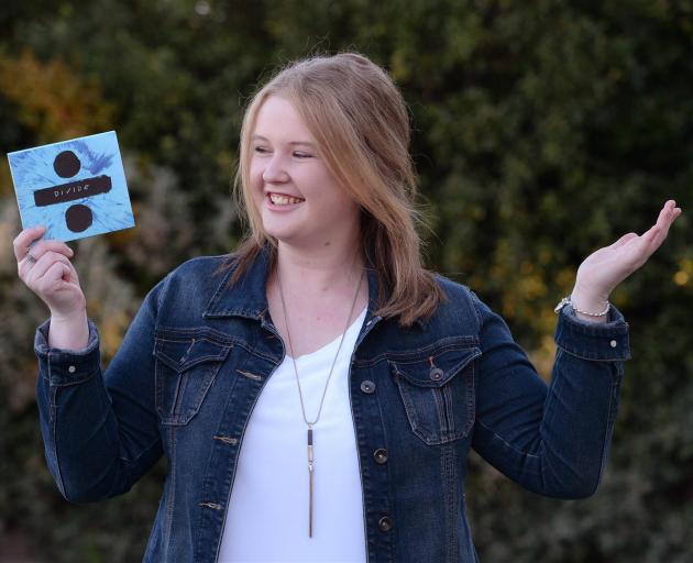 Ed Sheeran super fan Jess Kirk (24), of Dunedin, with a CD by the musician. Photo: Linda Robertson.
