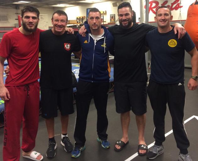 Dunedin boxing coach Ryan Henry (centre) with (from left) undefeated Russian light heavyweight Umar Salamov, boxing coach Kevin Barry, WBO heavyweight champion Joseph Parker and friend Thomas Kaan at UNLV boxing gym in Las Vegas. Photo: Supplied.