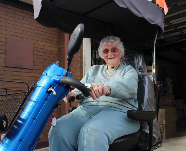 Central Otago Grey Power committee member Eileen Rawlings drives her mobility scooter on to the...