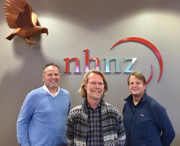 NHNZ managing director Kyle Murdoch (left) and former NHNZ owner David Haslingden (right) with its new owner, Blue Ant Media founder and chief executive officer Mike MacMillan. Photo: Peter McIntosh.