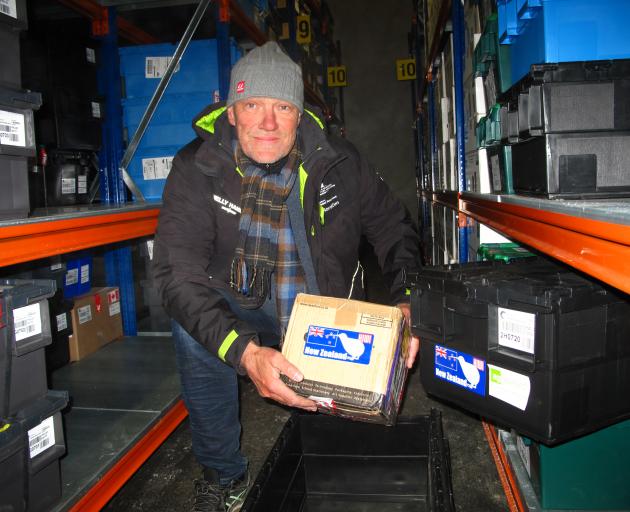 Svalbard Global Seed Vault co-ordinator Asmund Asdal, from the Nordic Genetic Resource Centre, holds the New Zealand seed package. Photo: Nordgen.