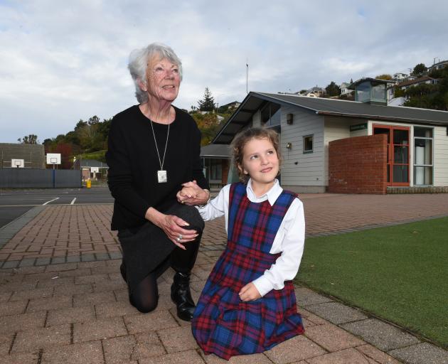 Retiring St Bernadette's School principal Jan Taylor with pupil Elise Frazer (5), her fourth grandchild to attend the Dunedin school. Photo: Gregor Richardson.