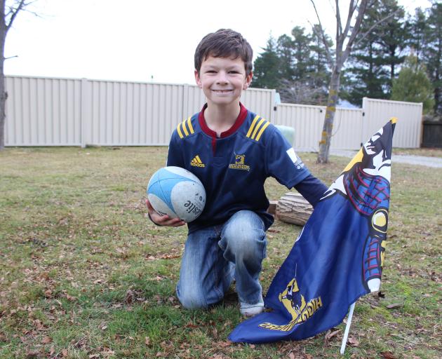 Cromwell boy Ben Griffiths (9) is gearing up to run the ball out at the Highlanders v Lions game...