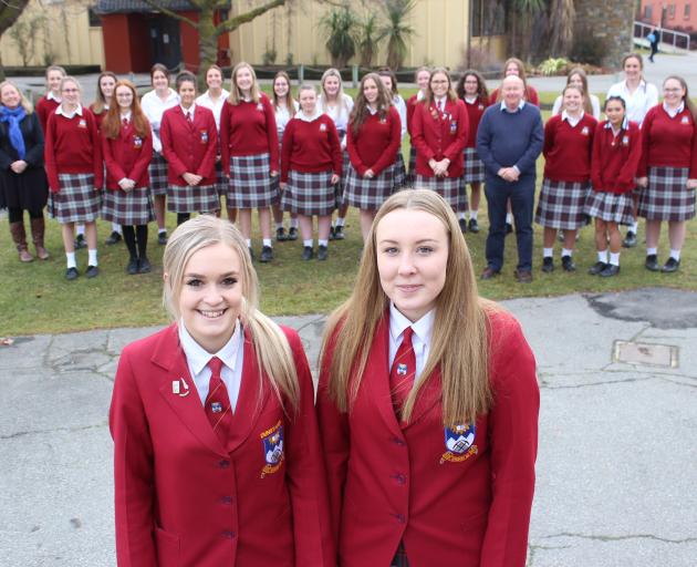 Dunstan High School Senior Girls' Choir leaders Dana Jenkins (18, left) and Holly Taucher (18) are hoping their efforts do not fall flat at the national Big Sing competition in Auckland in August. Photo: Jono Edwards