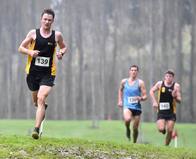 Janus Staufenberg, of Mount Aspiring College, leads Zach Mason, of King’s High School, boys grade...