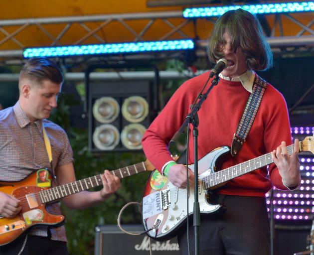 Kane Strang (right) plays with Dinosaur Sanctuary at the Feastock music festival in 2014.