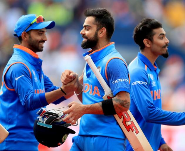 Virat Kohli (centre) celebrates India's win. Photo: Getty Images