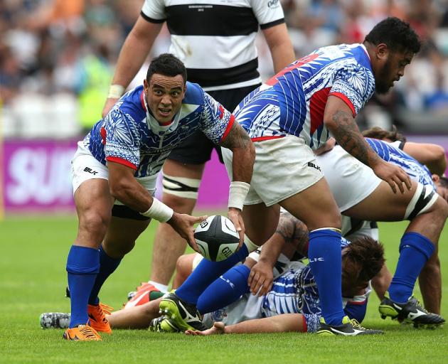 Kahn Fotuali'i clears the ball for Samoa in a game against the Barbarians in 2015. Photo: Getty...