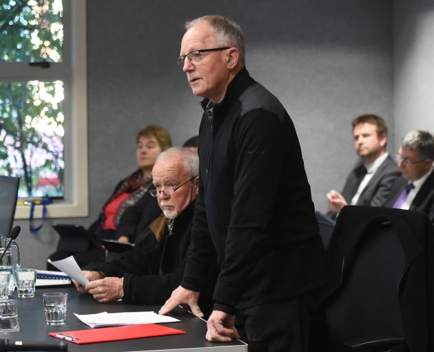 Lake Dunstan Guardian Howard Anderson, accompanied by guardian Ralph de Clifford (seated), speaks before helping present a petition to the Otago Regional Council. Photo: Gregor Richardson