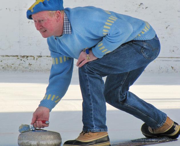 John ‘‘Snow’’ Hamilton, of Alexandra, plays for the Becks Curling Club at Ice Inline yesterday. 