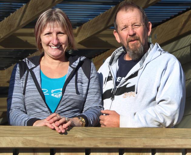 Melanie and Tony Bonney, formerly of Perth, on the deck of their renovated Kaitangata home. Photos: Samuel White