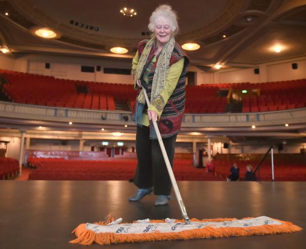 Regent book sale volunteer Margaret Lindsay adds the finishing touches to the Regent Theatre’s...