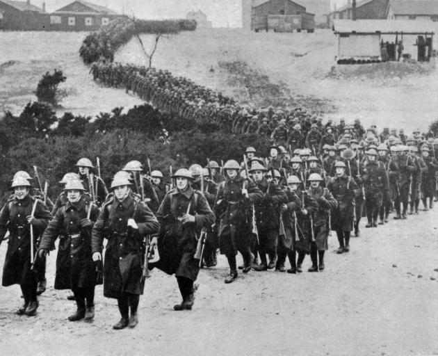 British troops on the way to the front to relieve their comrades in the trenches. — Otago Witness...