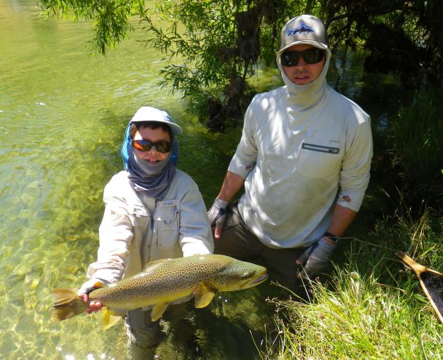 Fishing drew Post a Note founder Nathan Weathington, seen here with his son Hunter, to New Zealand. Photo: Supplied.