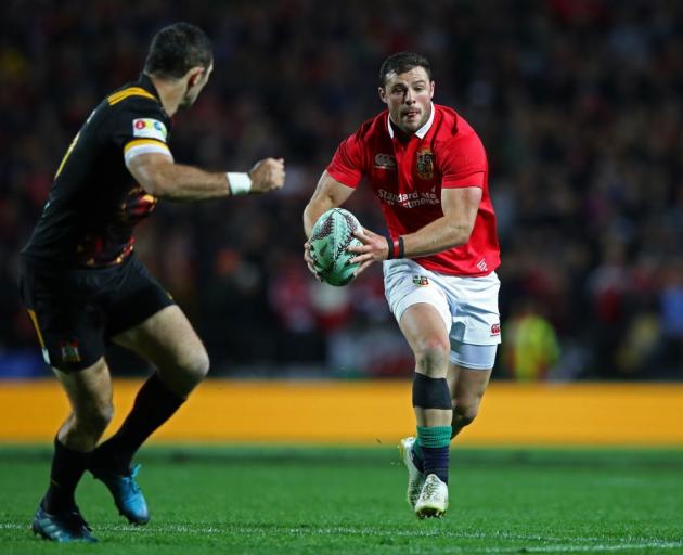 Robbie Henshaw runs the ball for the Lions against the Chiefs. Photo: Getty Images