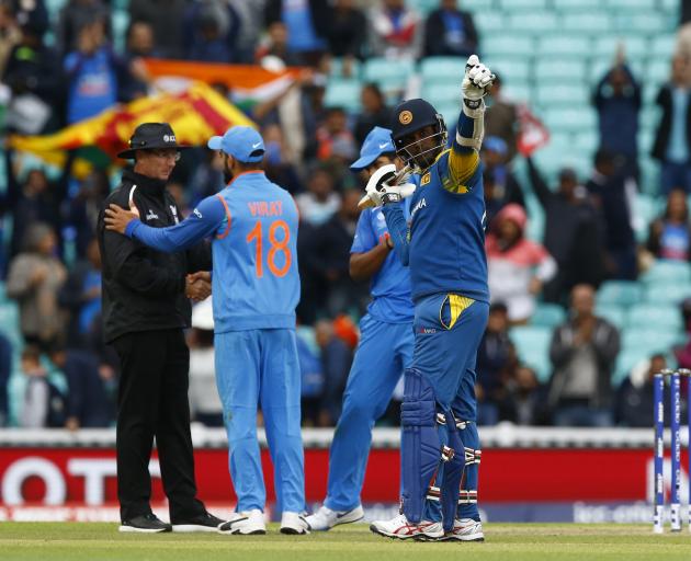Angelo Mathews celebrates Sri Lanka's win over India. Photo: Reuters