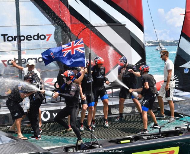 Team New Zealand celebrates its win over Oracle at the America's Cup. Photo: Getty Images