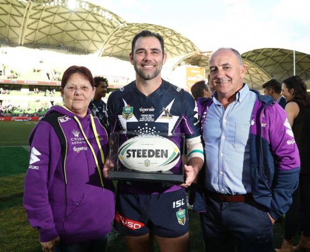 Cameron Smith with parents Sonia and Wayne after his 350th NRL game. Photo: Getty Images