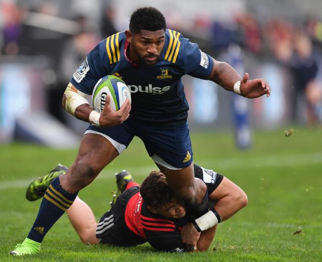 Waisake Naholo of the Highlanders is tackled by David Havili of the Crusaders in a match earlier this year. Photo: Getty Images