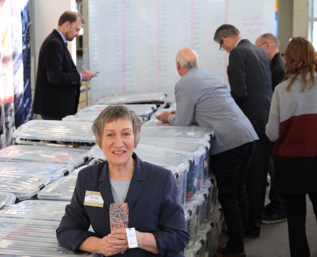 Holding the last tie counted, Irene Sparks relaxes with her world-record-breaking tie collection as her witnesses finalise the count in Oamaru on Saturday. Photo: Hamish MacLean