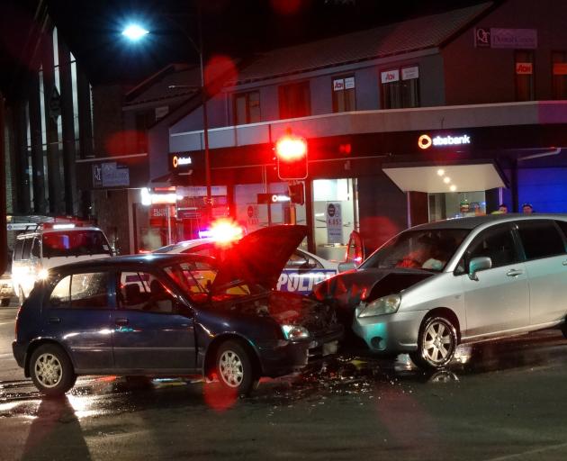 A head-on crash in Queenstown this morning between a Toyota Starlet and Suzuki Aerio on the corner of Stanley and Shotover Sts. Photo: David Williams