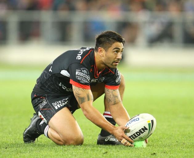 Shaun Johnson lines up a kick during the Warriors' game against the Bulldogs in Dunedin earlier...