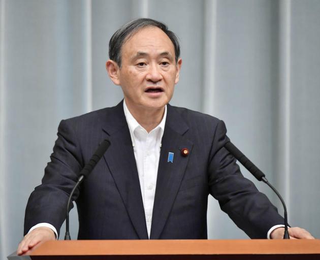 Japanese Chief Cabinet Secretary Yoshihide Suga speaks at a news conference about North Korea's missile launch. Photo: Reuters