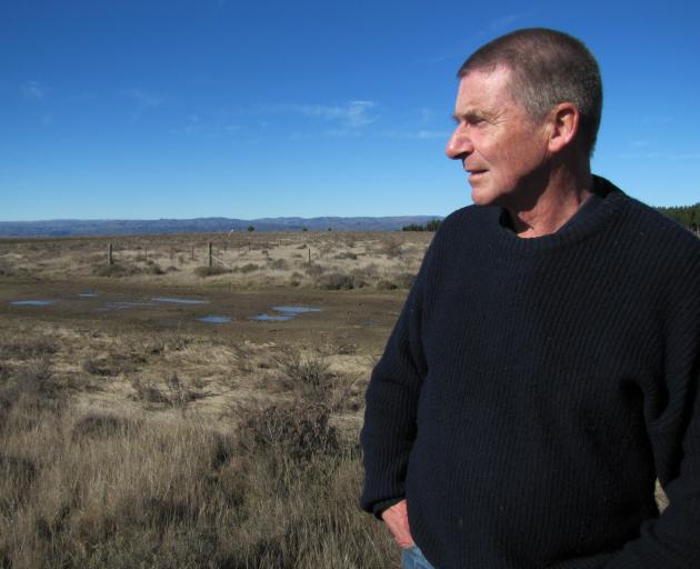 Clyde man Russell Garbutt looks over an area beside the Clyde commonage and Clyde Town Belt,...