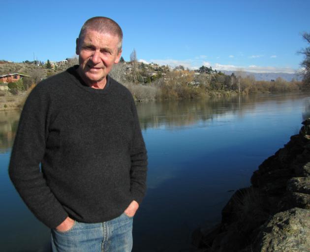 Clyde man Russell Garbutt contemplates the possibility of using water-sourced heat pump technology and the Clutha River to warm Central Otago residents and businesses. An idea for a community heating scheme using the technology is under investigation by a