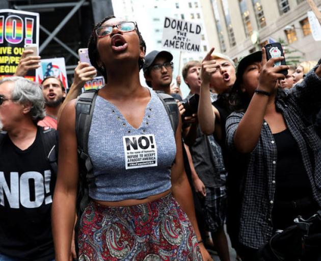 Anti-racism protesters shout during protests in front of Trump Tower in New York City. Photo: Reuters