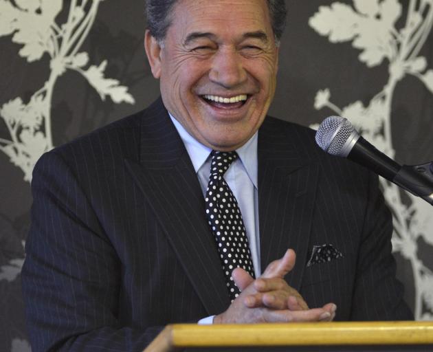 NZ First leader Winston Peters laughs in front of his audience in Dunedin yesterday. Photo:...