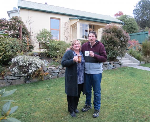 Linda and Casper Barnard raise a mug to their new house in Mornington. PHOTO: JOSHUA RIDDIFORD