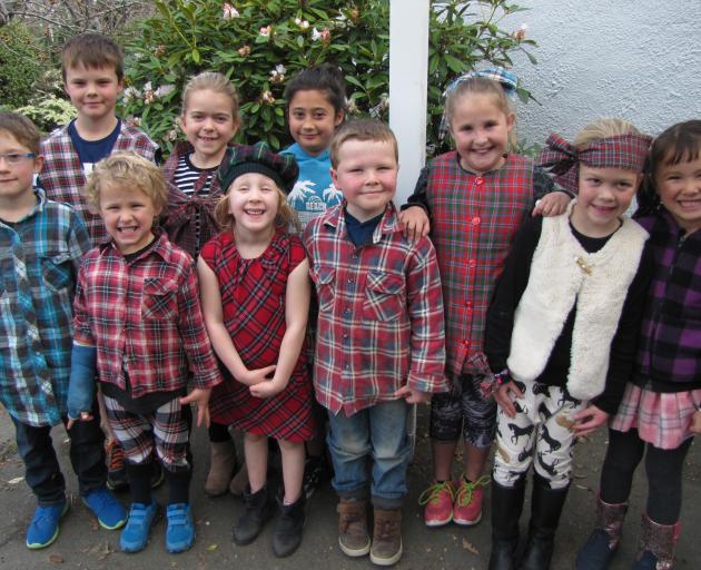 Roxburgh Area School junior pupils show some Scottish spirit as they dress for yesterday’s...