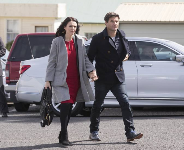 Labour leader Jacinda Ardern and partner Clarke Gayford arrive at St David's Cooperating Parish in Te Aroha for the funeral of Ardern's grandmother. Photo: NZME