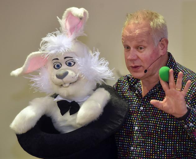 Ringo the Rabbit and magician Elgregoe (Greg Britt) teach Sacred Heart School pupils how to make...