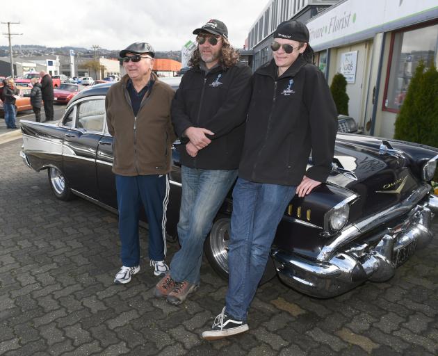 Derek (77), Mike (48), and Keri Wilson (19) (aka Gazza, Wazza and Bazza) pose with their 1957...