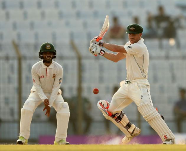 David Warner bats for Australia against Bangladesh. Photo: Getty Images