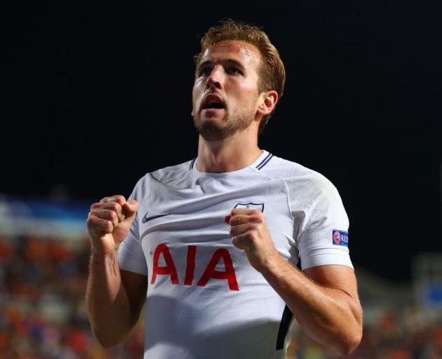 Harry Kane celebrates one of his goals for Spurs this morning. Photo: Reuters