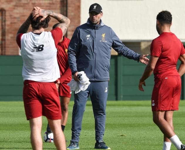 Juergen Klopp makes a point at Liverpool training. Photo: Getty Images