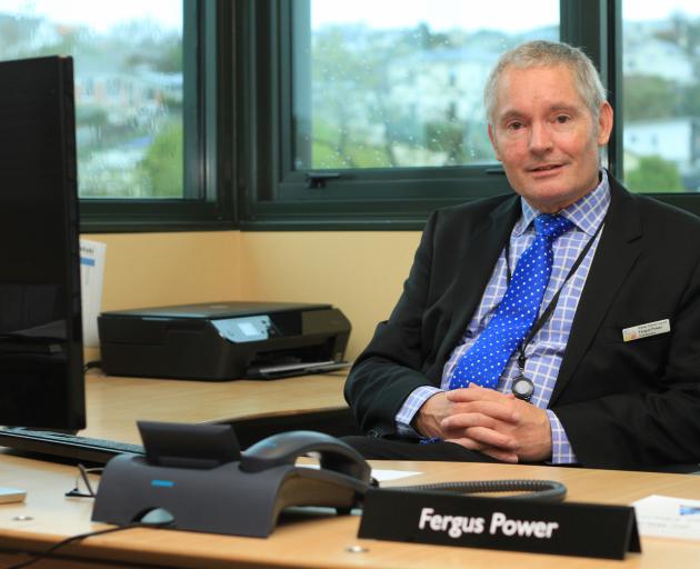 Waitaki District Council chief executive Fergus Power settles in to his new office on his first...