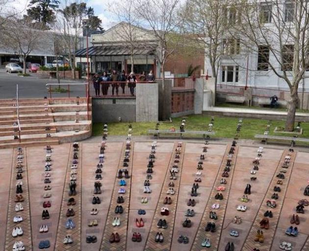 Six hundred and six pairs of shoes each representing a New Zealander lost to suicide last year - pictured here at Whanganui's Majestic Square last week - have arrived at Parliament. Photo: NZ Herald