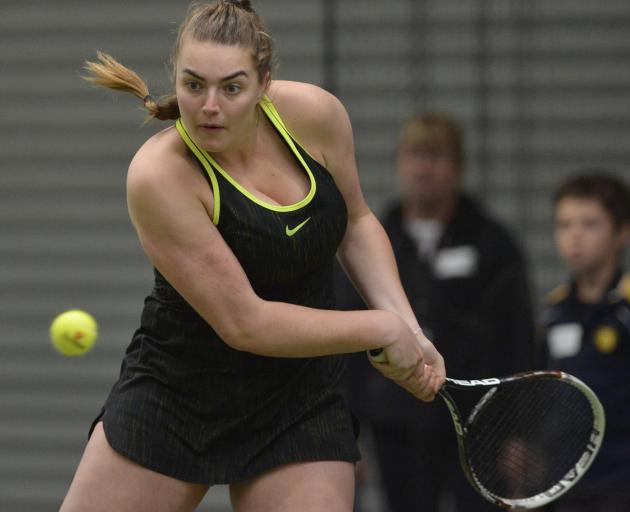 Megan Rogers (19) prepares to play a backhand during her Otago indoor open women’s final against...